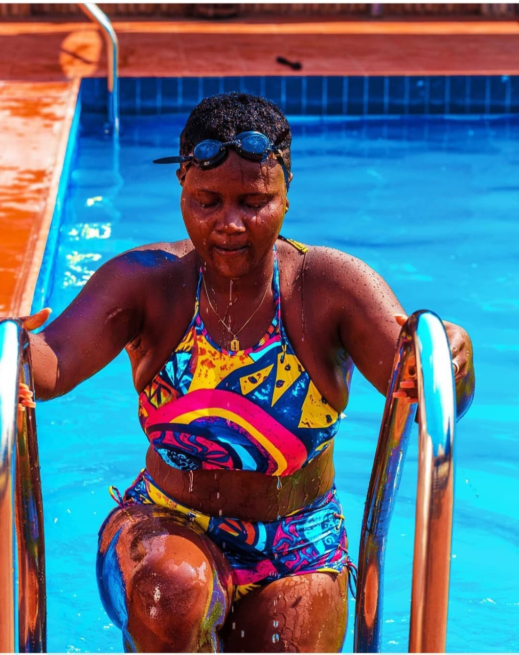 Guest stepping out of the swimming pool